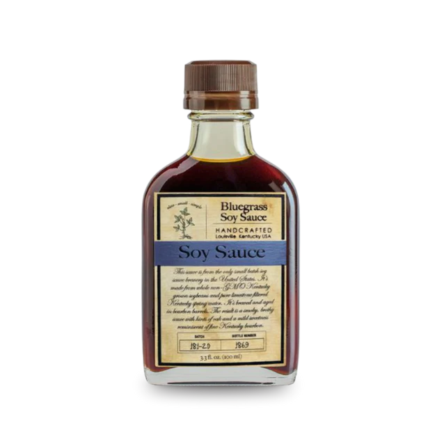 Bottle of Bluegrass Soy Sauce – small-batch, bourbon barrel-aged soy with meaty, briny flavor.