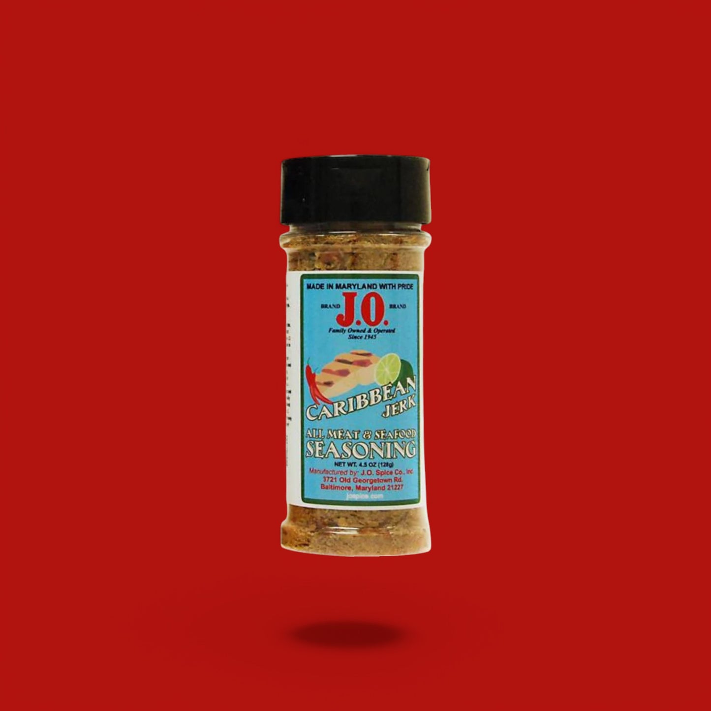J.O. Seasoning Caribbean Jerk Seasoning jar with bold Caribbean-inspired spices, rustic background