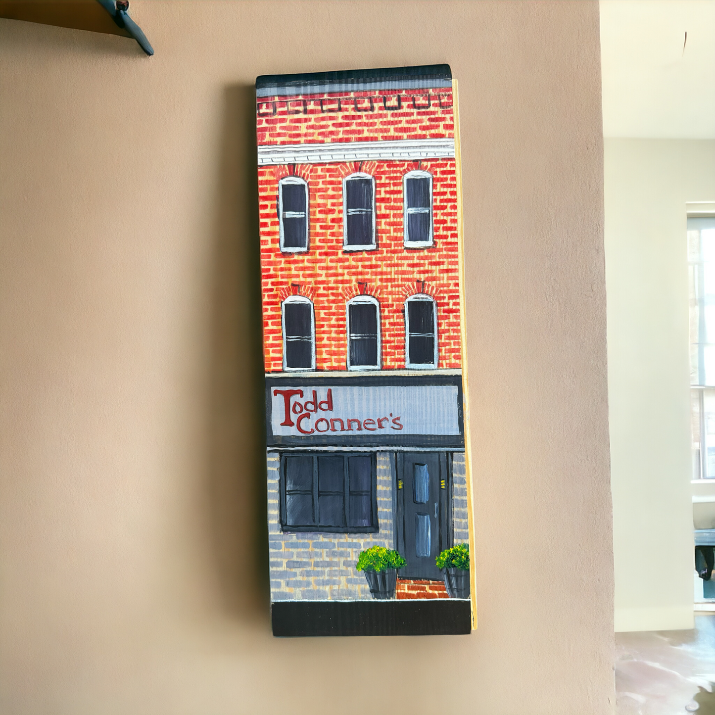 Linda Amtmann wooden plank painted in the likeness of Todd Conners