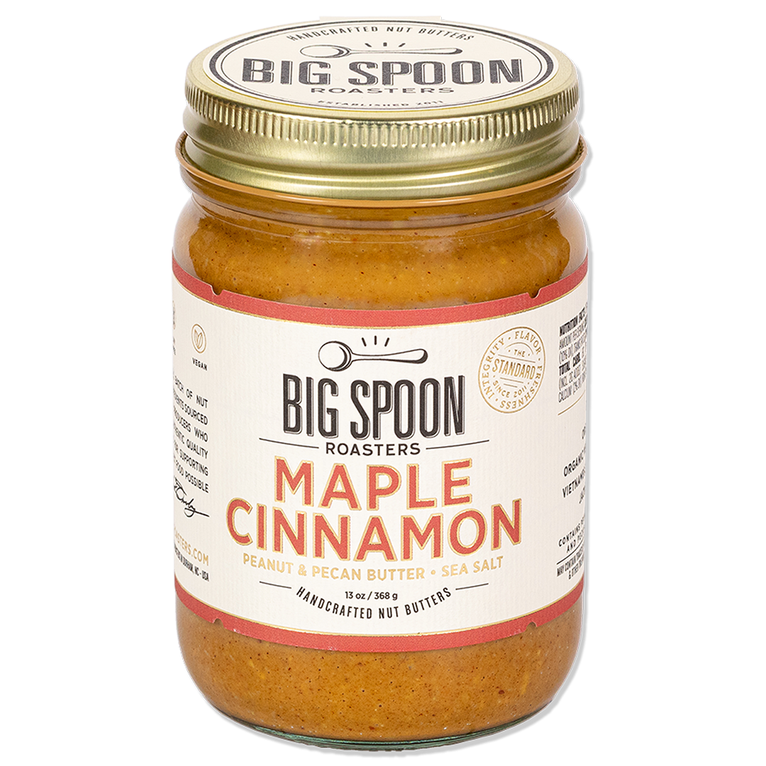 Jar of Big Spoon Roasters Maple Cinnamon peanut and pecan butter on a white background